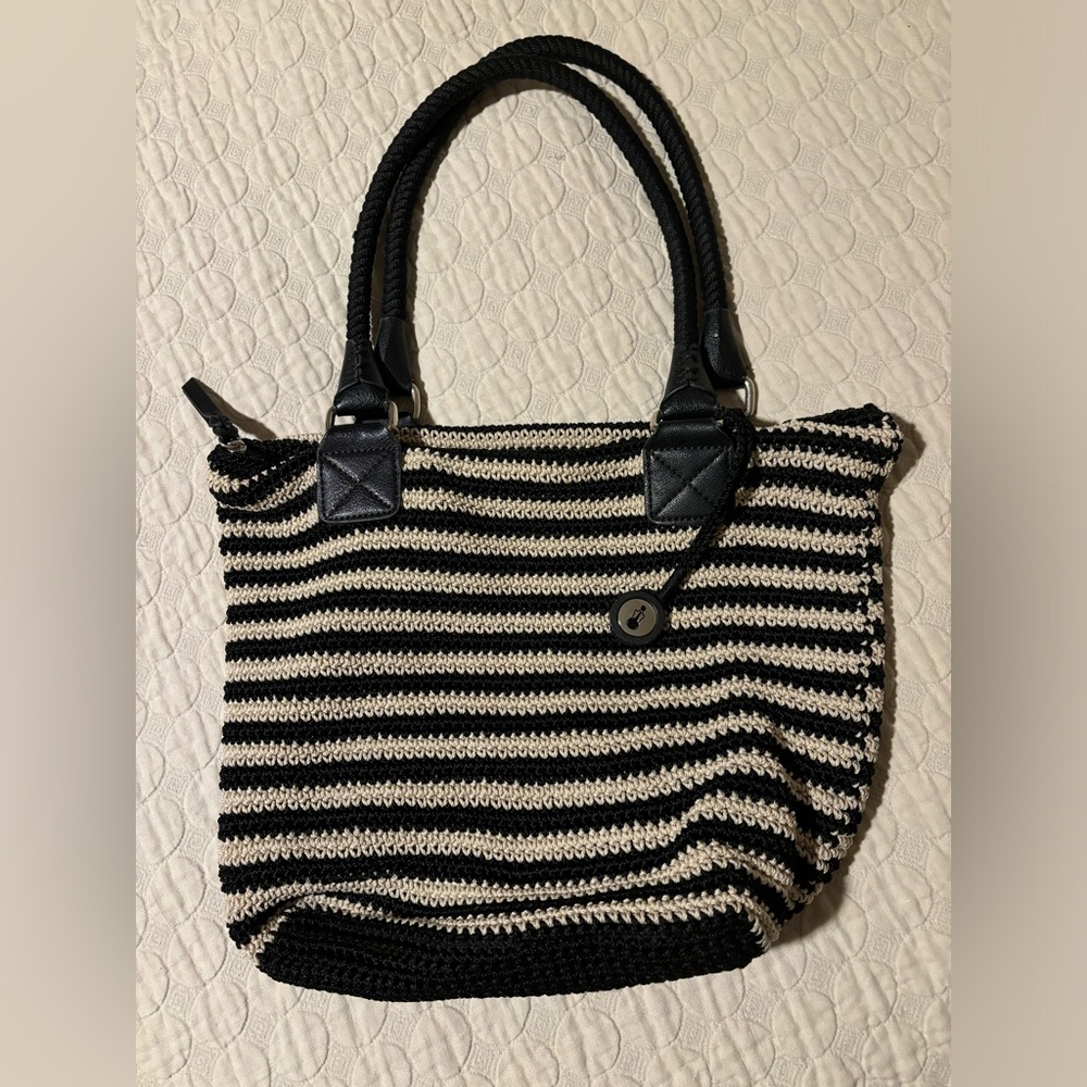 The Sak black and cream purse